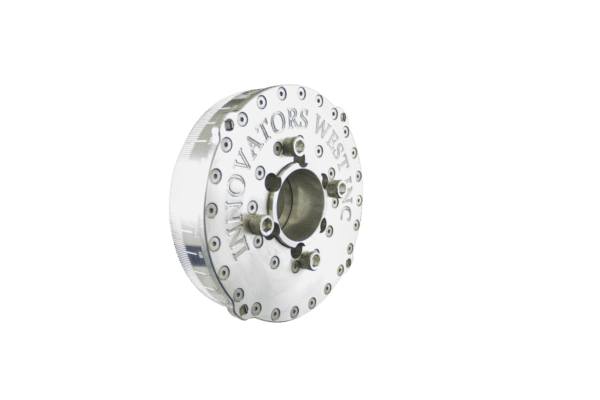 Silver Innovators West 6.5″ Small Block Ford Damper, engraved, with a circular design and multiple bolts, set against a black backdrop.