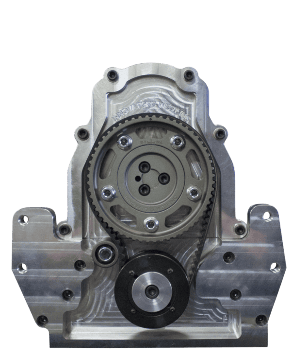 Close-up of the Innovators West LSX Chevy Camshaft Belt Drive (#5201), showcasing its silver, metallic component with a circular gear and pulley system, intricate details, and bolts for an industrial look.